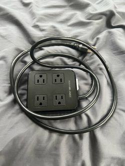 Weatherproof surge protector