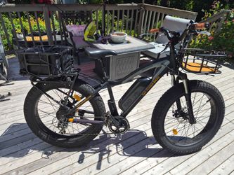 Two Rad Power Ebikes, 3 batteries and chagers, lots of accessories