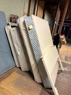 Used Mattresses and White Headboard Lot