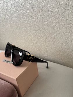 Miu Miu Black Women’s Sunglasses