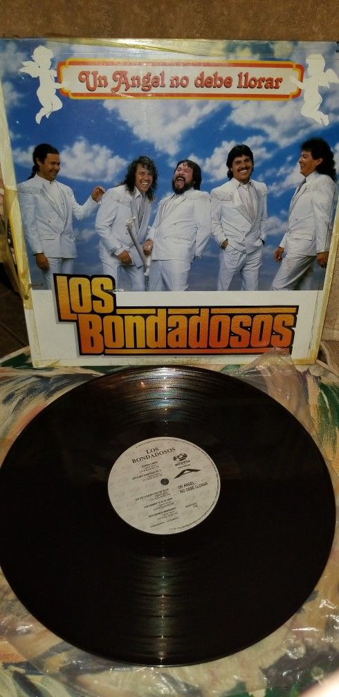 Los Bondadosos - Un Angel No Debe Llorar disco/record! Muy raro!! Que romantico canciones!