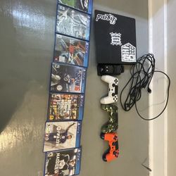 PS4 Black Comes With Controller And Games And Cords 