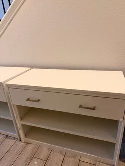 2 Living Spaces console tables.