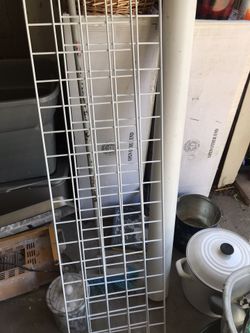 White floating storage shelves for the garage