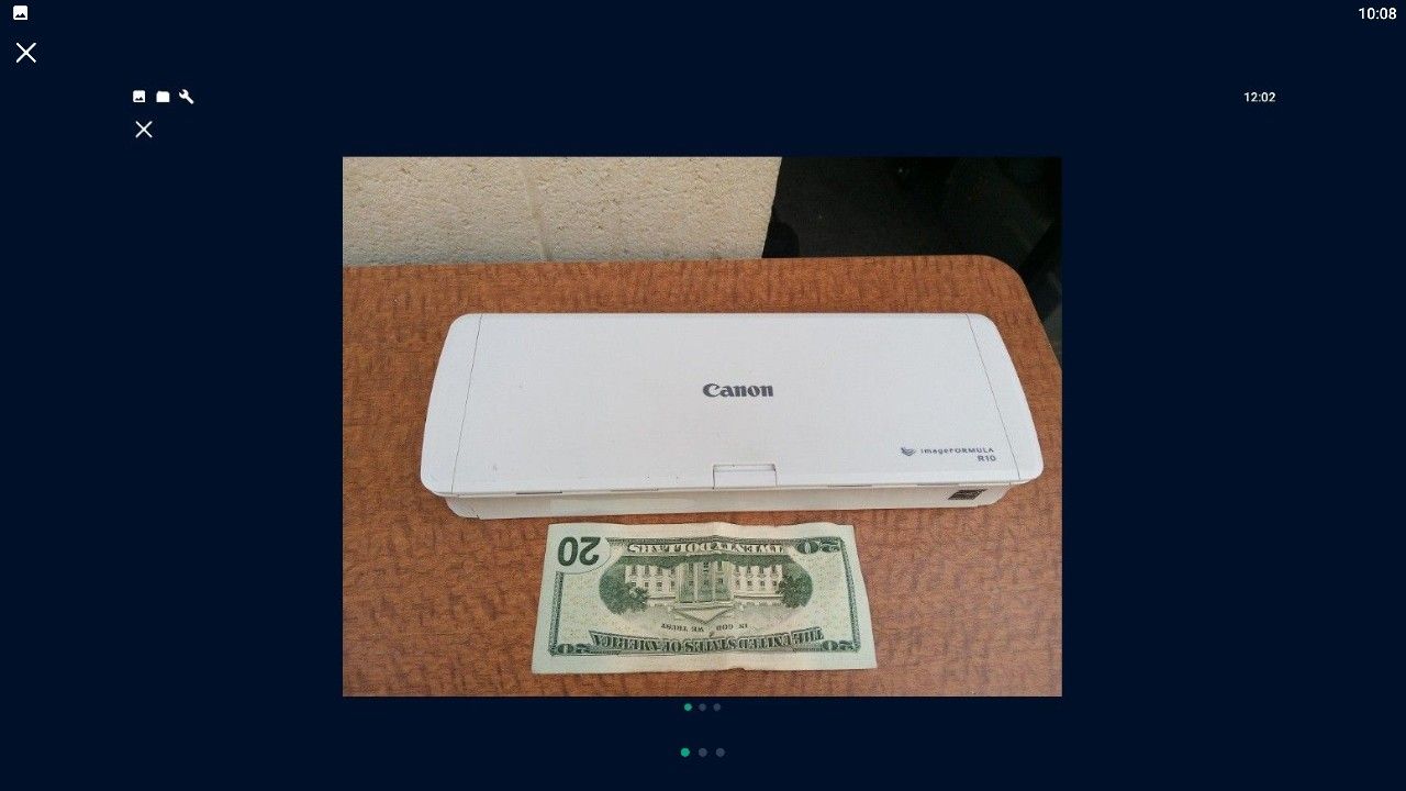 CANON image formula R10 portable sheet fed scanner. USB connection . connect to laptop while on the road. USB amd CABLE included.