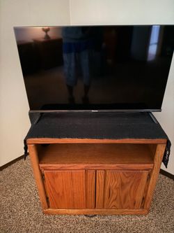 T v with stand and sound bar