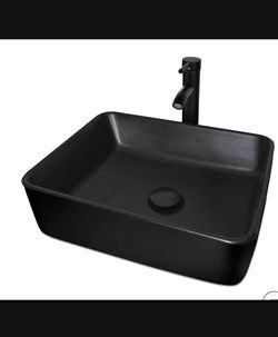 New in it’s box ELECWISH Ceramic Bathroom Sink, Above Counter Porcelain Vessel Sink with Black Fauce