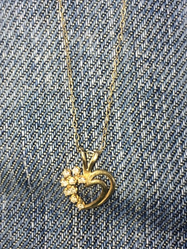 14kt gold small thin chain with 14kt diamond heart $125