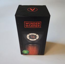 Wunder Warmer plug-in small personal space heater. new open box.... tested and they work well