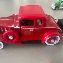 5 collectible trucks   2 Bank trucks 1 Ajax Flatbed truck 1 Publix Semi truck with doors that open 1 Red Ford fire chief truck  ALL 5 for $100 