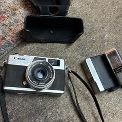  vintage Canon Canonet 28 w/ two  vintage Canon Canolite D electronic camera flash units