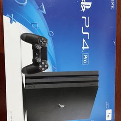 PS4 Pro 1TB - LIKE NEW With 4 Games 