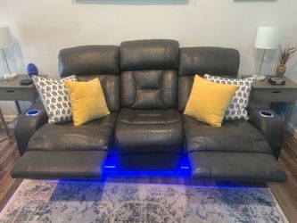 LIKE NEW RECLINING, GRAY LEATHER COUCH AND LOVESEAT