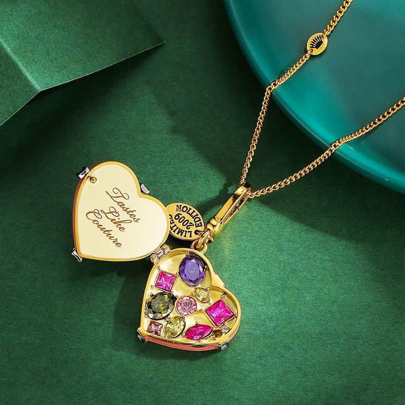 A stylish pink enamel-glazed openable bow heart-shaped box pendant, and a sweet heart-shaped gemstone box necklace