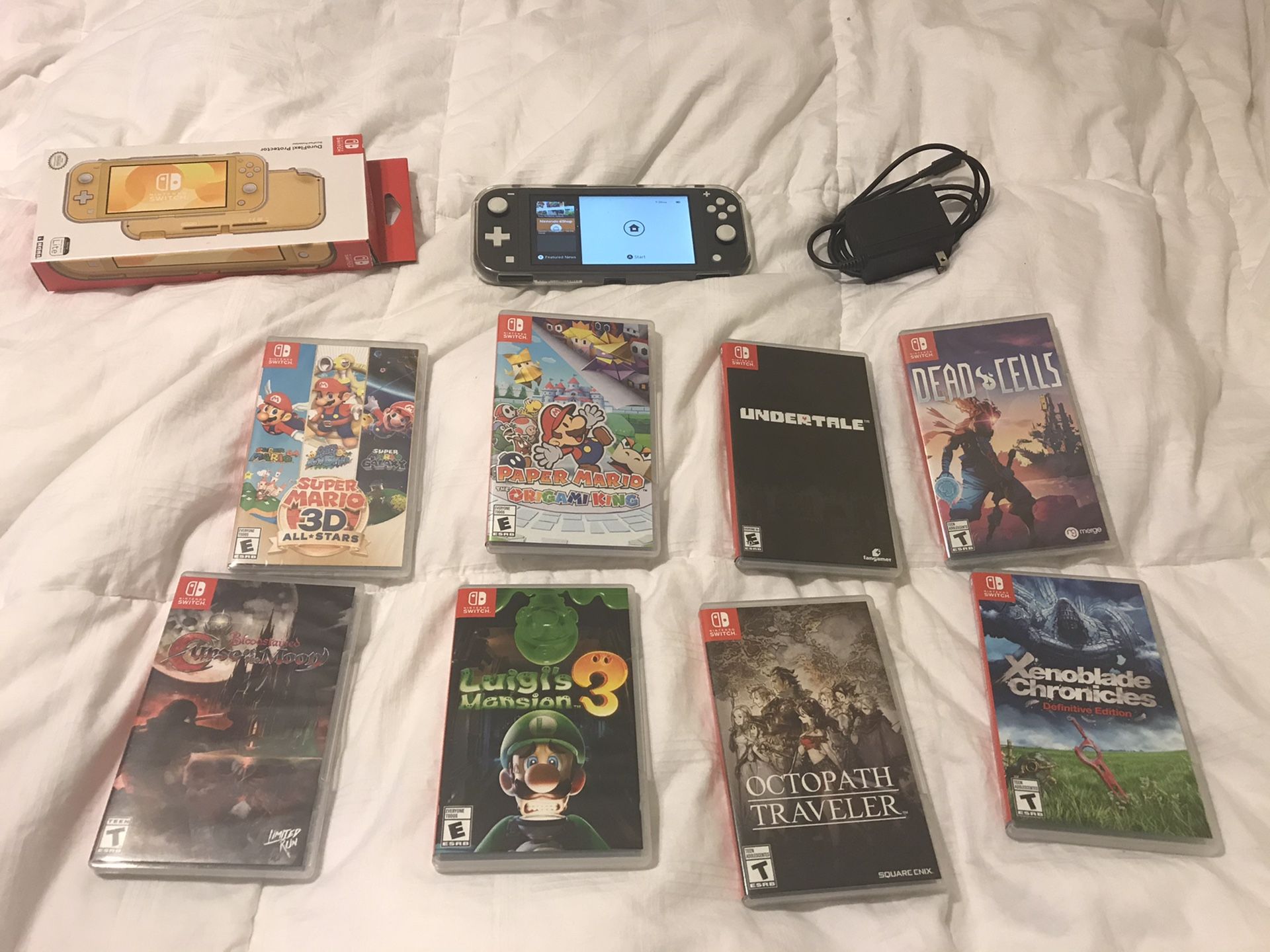 Nintendo Switch lite with 8 games Mario 3D Allstars and more