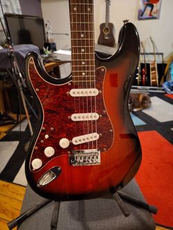 Left handed 2005 Stratocaster Squier standard in Antique Burst