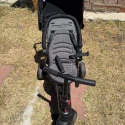 Barely Used Stroller With Pedals