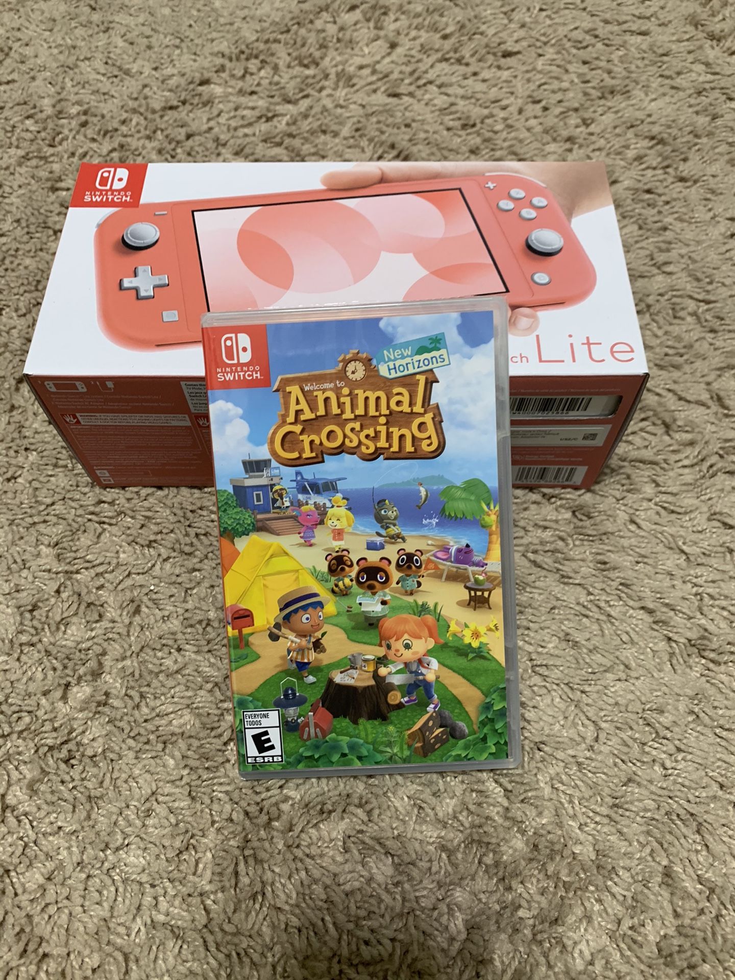 Nintendo Switch Lite (Coral) Bundle Includes Animal Crossing: New Horizons  