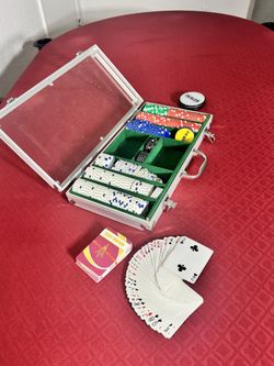 Poker table in good condition, perfect for game nights. Includes full chip set, cards, and carrying case. * Foldable legs for easy storage * Built-in