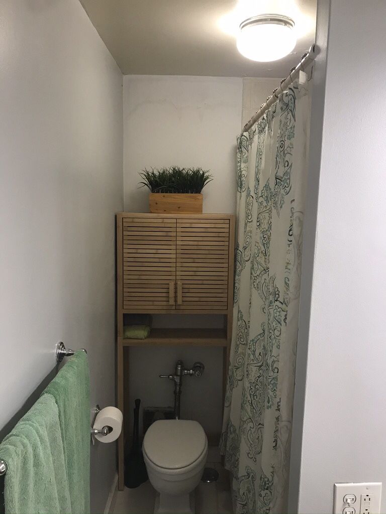 Over toilet shelf unit