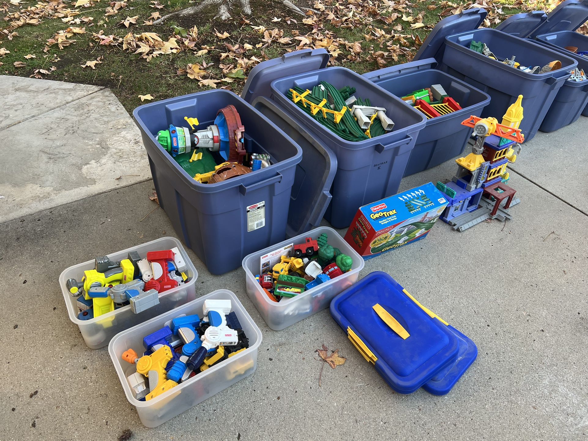 Six Large Boxes Of Fisher Price GeoTrax Toys For Kids