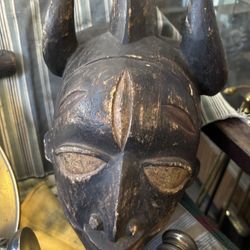 Carved Smiling Horned African Mask