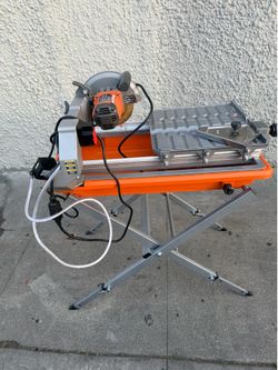 9-Amp 7 in. Blade Corded Wet Tile Saw with Stand like new $320
