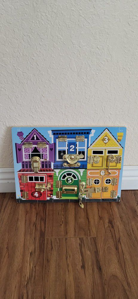 Practically New Melissa & Doug Latches Board ( Price Firm!)