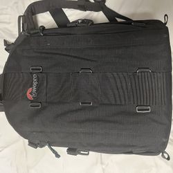 Lowepro camera bag ~17in H, ~13in L, ~6in W (Comes with adjustable dividers inside)
