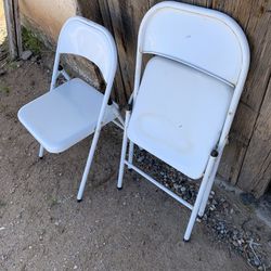 2 White Steel Folding Chairs. EACH