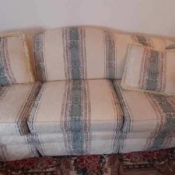 Well made Couch and Love-seat with matching pillows. 