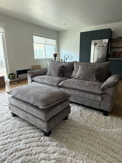 Grey couch with detachable ottoman