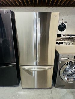 LG Stainless Steel Refrigerator (30" x 67" x 29") — Includes a receipt for a 90-day warranty.