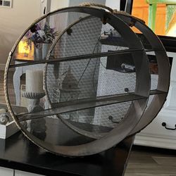  round metal wall shelf with a mesh backing and rope detailing. x 2