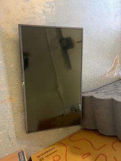 LG Flat Screen Monitor used but works. Comes with a wall mount