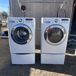 LG Electric Washer And Electric 220 Plug Dryer Set With Pedestals For Sale $400 - OBO
