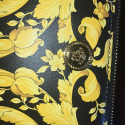 Black and gold unisex versace bag 