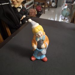 Vintage Smiling Clown Colorful Porcelain Wearing A Bow Tie Holding An Umbrella 7.25" Tall 