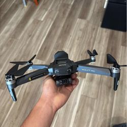 AOVO DRONE stabilizing 4k camera WITH EXTRA BATTERIES