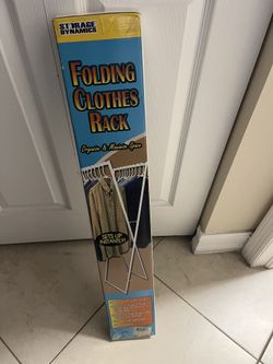 Folding Clothes Rack . Brent New