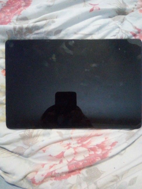 It's A Black Tablet And The Brand Is Samsung