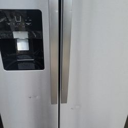 Whirlpool Side by Side Refrigerator  (Small dents at the door)