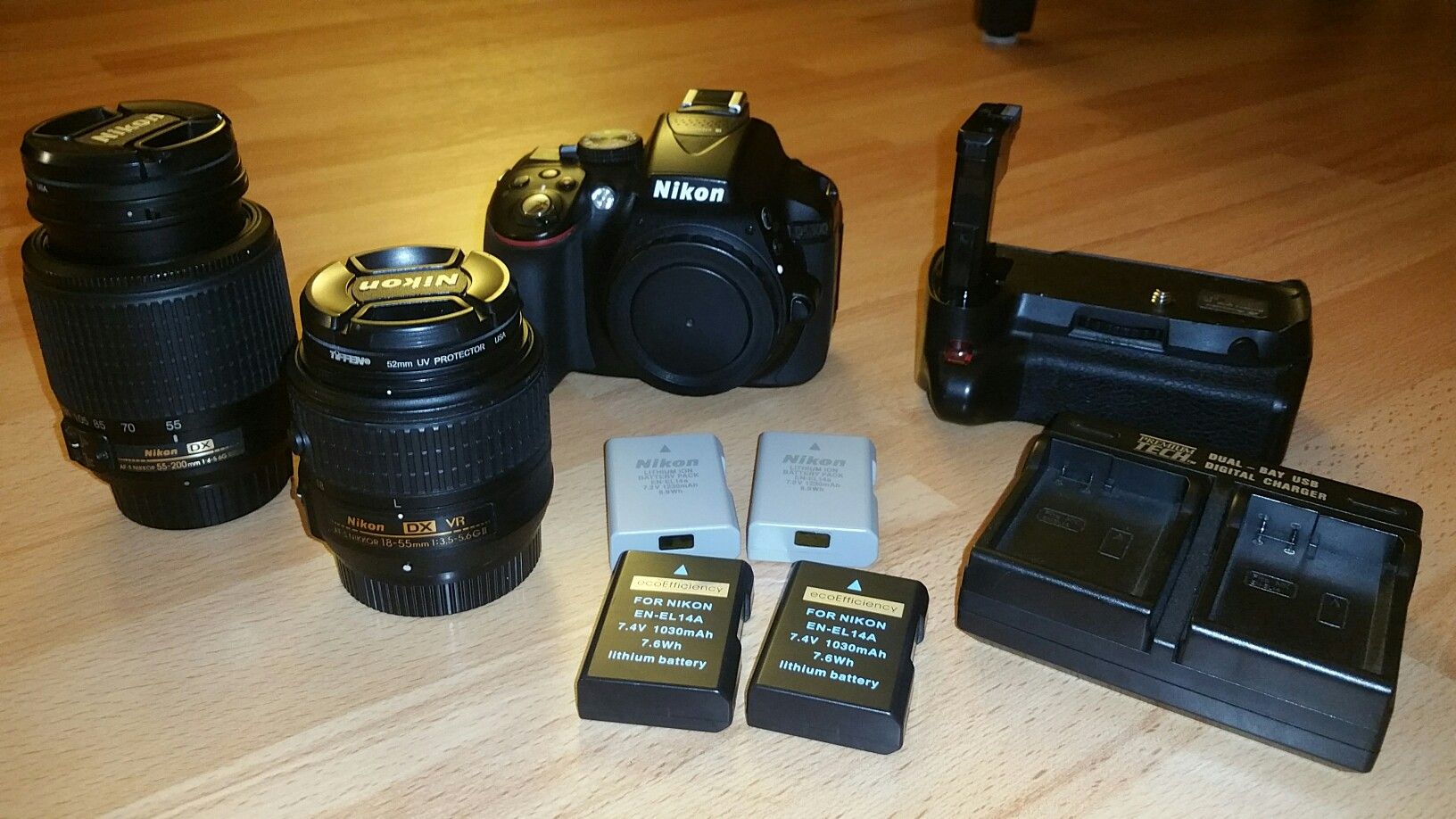 Nikon D5300 camera with 2 lenses, 4 batteries, 2 chargers, 1 battery grip, and 1 remote control!!