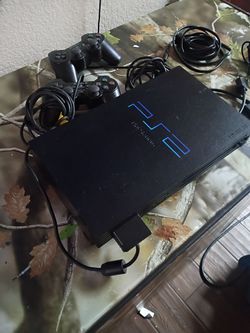 Ps2, HDMI adapter, HDMI cord, power cord, 2 ps2 controllers