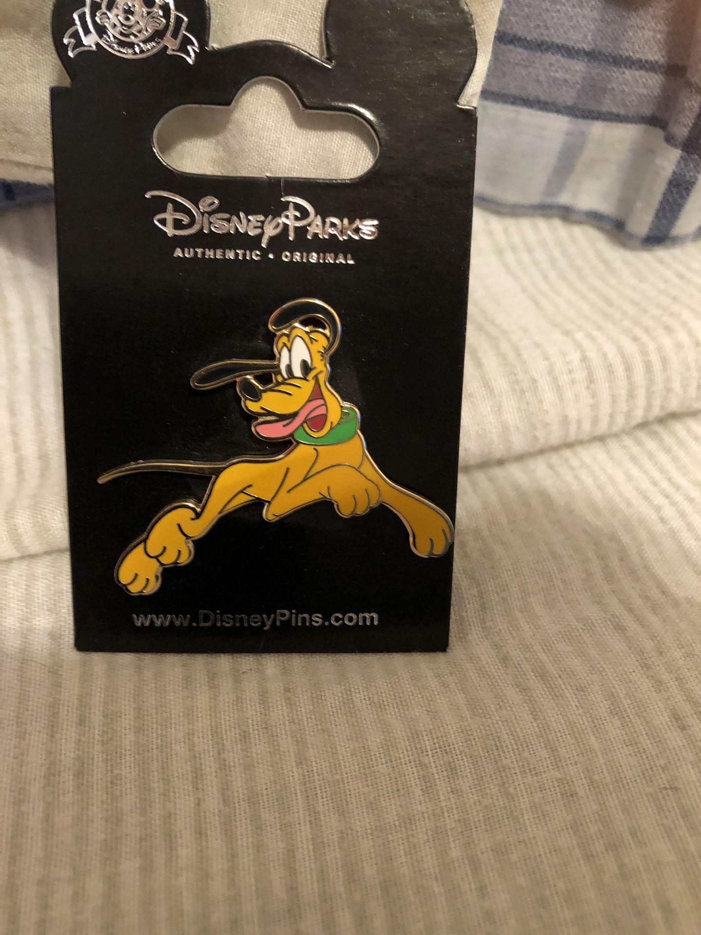 Disney’s Pluto Authentic collector’s edition pin Brand New never removed from original packaging never worn