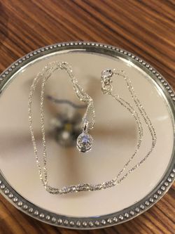 Sterling silver and diamond necklace and pendant