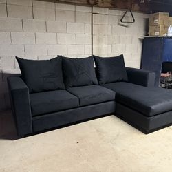 new  sofa with reversable chaise black velvet