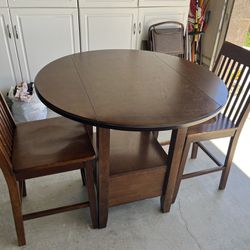 Table & chairs, drop leaf style. 
