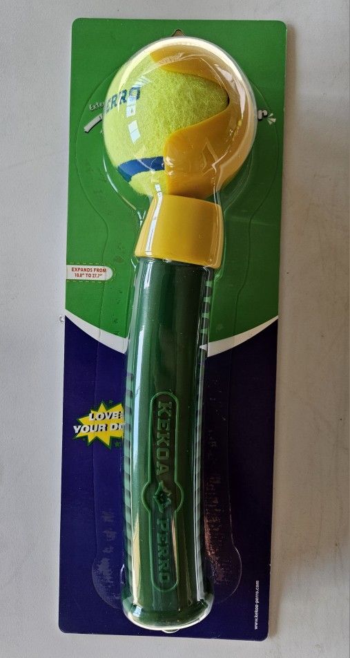 New never been used telescopic or retractable dog ball launcher.