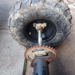 atv 125 Axle, wheels and swing arm.